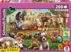 Puzzle Um piquenique no jardim para cães e gatos